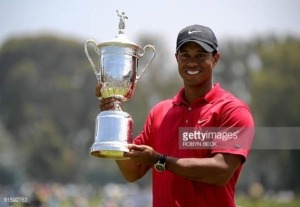 Woods digs deep, edges Mediate in playoff to win Open